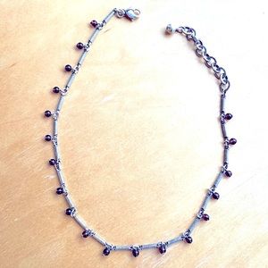 Silver necklace with dark burgundy beads
